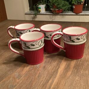 Set of 4 mugs by Cracker Barrel “Plaid Tidings” $16 ea on Replacements. Com